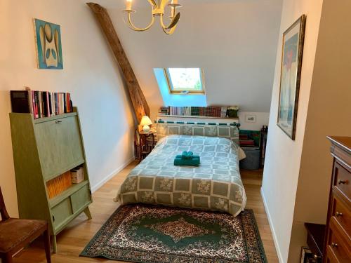 Posteľ alebo postele v izbe v ubytovaní Charmante maison en pierre au coeur du Berry