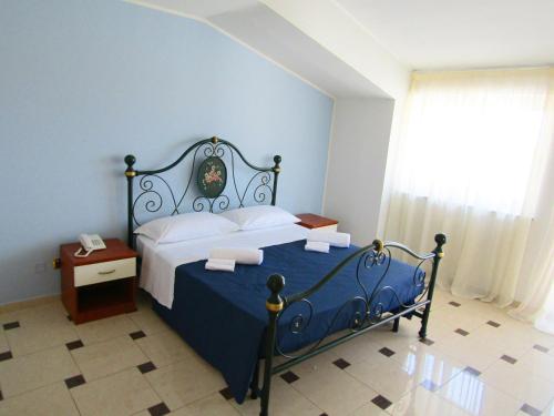 Vuode tai vuoteita majoituspaikassa Grand Hostel Calabria