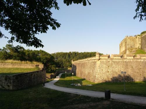 a view of the wall of a castle at El Oasis de la Estafeta in Pamplona