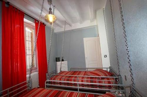 Ein Bett oder Betten in einem Zimmer der Unterkunft Chateau de Vaugrignon - Beer Spa