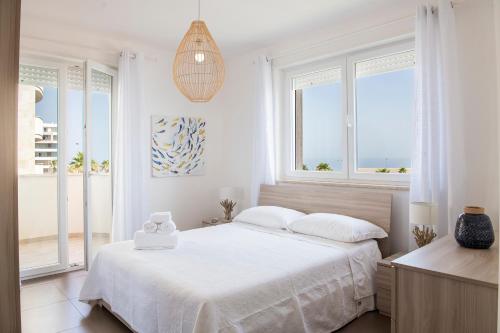 A bed or beds in a room at Casa Tiziana - ApulianStay Group