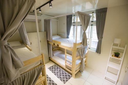 Postel nebo postele na pokoji v ubytování KM Hostel