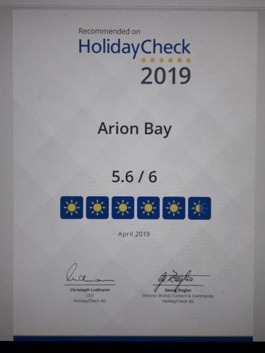 a confirmation screen for a holiday check for an atom bay event at Arion Bay Hotel Santorini in Kamari