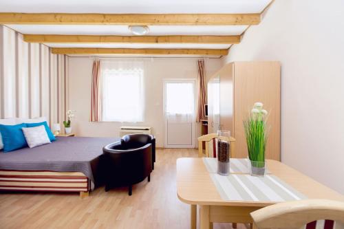 Posedenie v ubytovaní Apartman Szanyi
