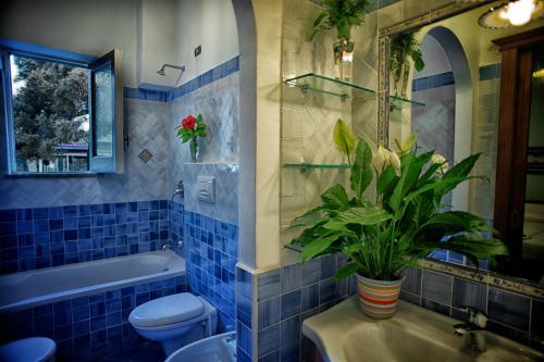 Phòng tắm tại Hotel Corallo