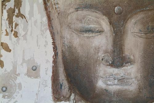 a painting of a face on a wall at Le Petit Boutique Hotel in Santander