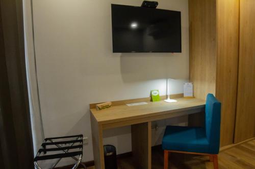 TV a/nebo společenská místnost v ubytování EcoHub Hotel Medellin