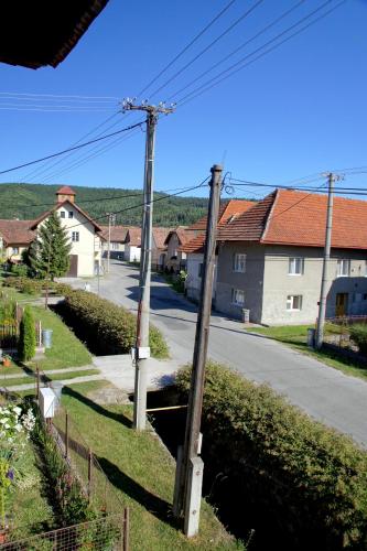 a telephone pole on the side of a street at Apartmán v Háji - Jache dom in Turčianske Teplice