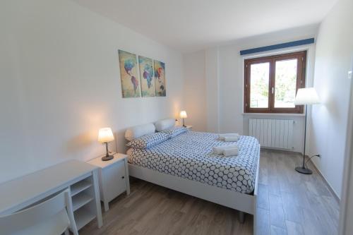 A bed or beds in a room at Apartment Bolsena