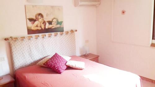 Katil atau katil-katil dalam bilik di Villa Panoramica Capitana