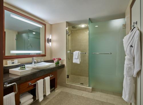a bathroom with a sink and a shower at Battery Wharf Hotel, Boston Waterfront in Boston