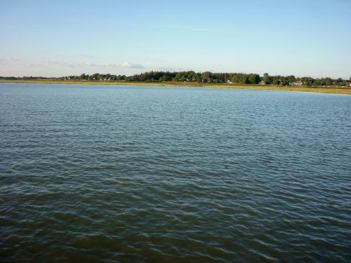 a view of a large body of water at Nordseeblick in Husum
