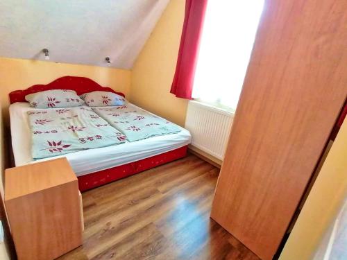 Katil atau katil-katil dalam bilik di Villa AIDA Apartman