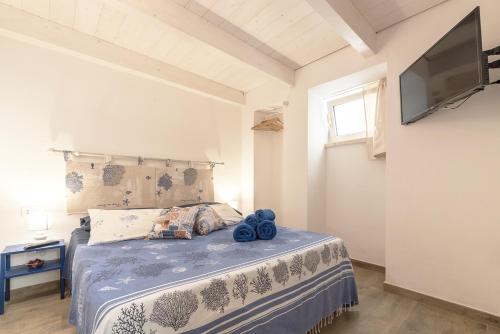 Een bed of bedden in een kamer bij AnSe' casa vacanze