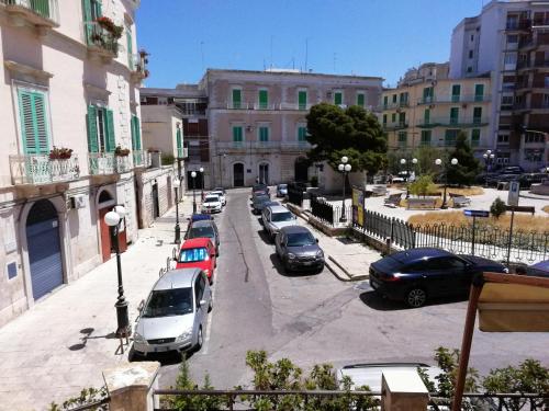 a group of cars parked in a parking lot at Ventisei in Molfetta