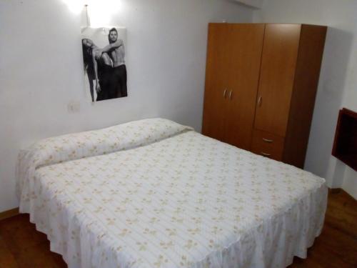 Łóżko lub łóżka w pokoju w obiekcie Il Nido