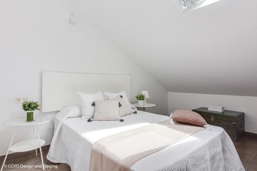 Ένα ή περισσότερα κρεβάτια σε δωμάτιο στο Apartamento Playa de Quenxe