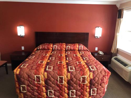 Ένα ή περισσότερα κρεβάτια σε δωμάτιο στο Budget Inn - New Albany