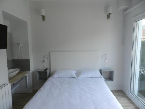 Cama o camas de una habitación en Tu Casa en Santander
