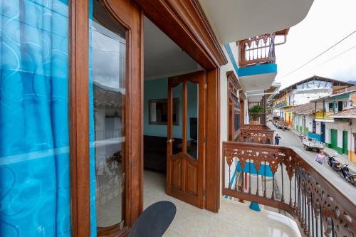 a balcony with a view of a building at Apartamentos Primavera in Jardin