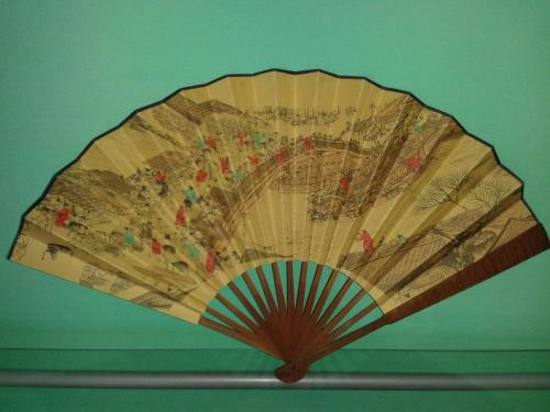 a wooden umbrella with a painting on the wall at B&B William in Padova