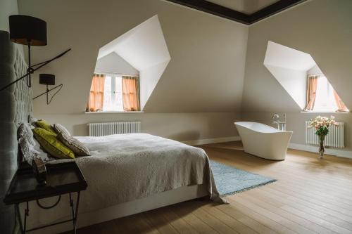 Ένα ή περισσότερα κρεβάτια σε δωμάτιο στο Weranda Home
