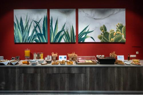 a buffet line with food on top of it at Kleopatra Inn in Messini
