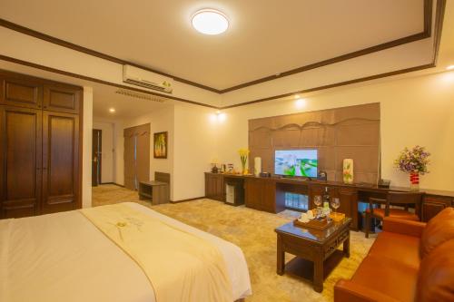 Vuode tai vuoteita majoituspaikassa Westlake Hotel & Resort Vinh Phuc