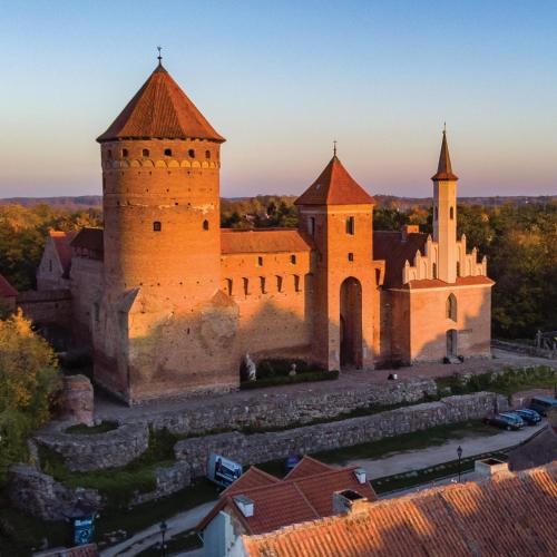 an aerial view of a castle with turrets at Zamek Reszel in Reszel