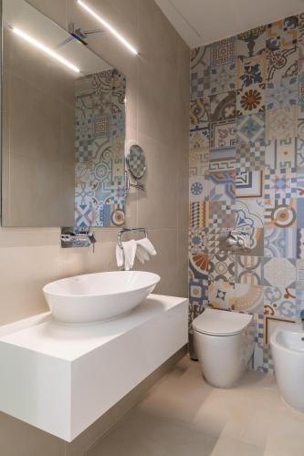 a bathroom with a sink and a toilet at MYN in Rabat in Rabat