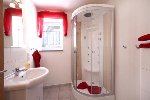 Vonios kambarys apgyvendinimo įstaigoje Appart-Hotel Harmonie