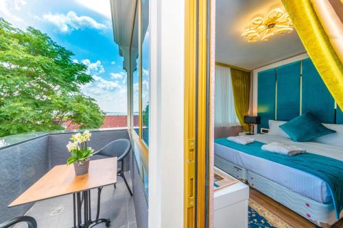 Postel nebo postele na pokoji v ubytování Eastanbul Suites
