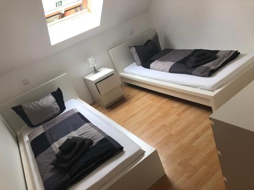 Postel nebo postele na pokoji v ubytování Ferienwohnung 2 - Gourmetzimmer