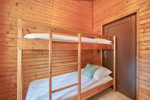 En eller flere senge i et værelse på Ferienpark Grafschaft Bentheim