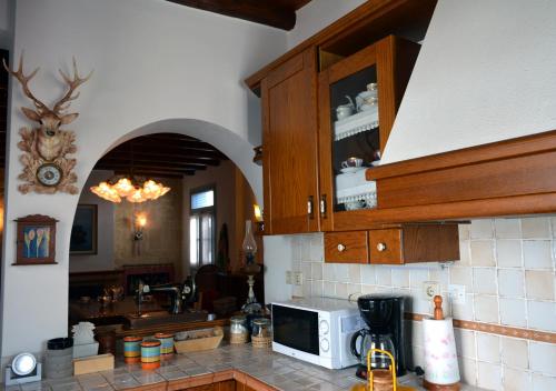 Dapur atau dapur kecil di Heliotropio Studios & Apartments