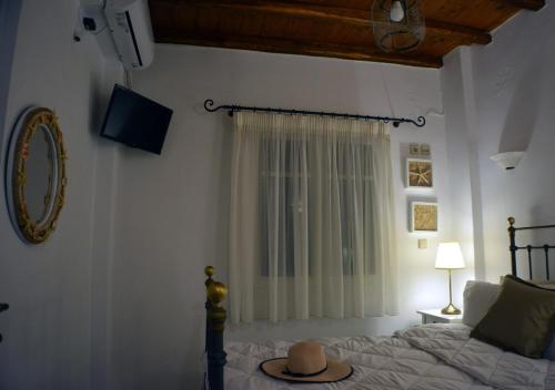 Katil atau katil-katil dalam bilik di Heliotropio Studios & Apartments
