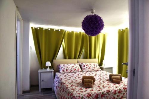 Katil atau katil-katil dalam bilik di Superattico panoramico