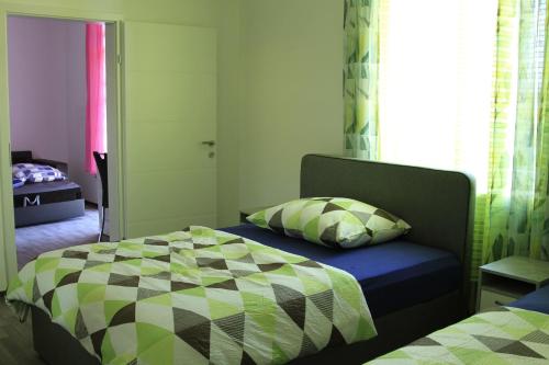 Postel nebo postele na pokoji v ubytování Apartment Fonhauser