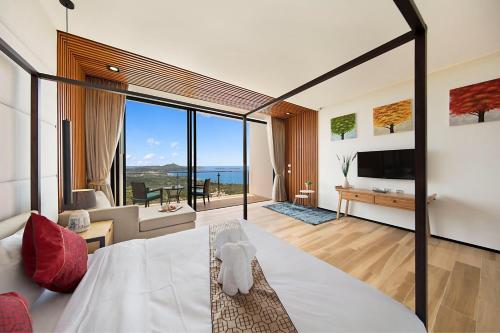 Voodi või voodid majutusasutuse Samui Sea Star Villa toas