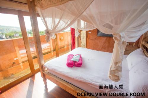 เตียงในห้องที่ Kenting Afei Surf Hostel Nanwan