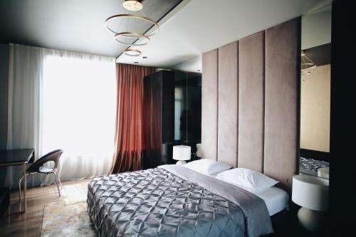  Кровать или кровати в номере BonApartments 