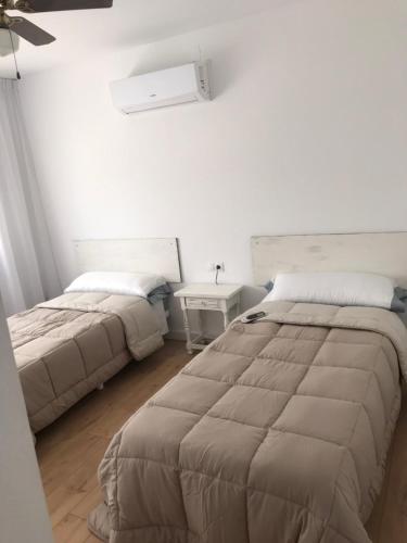 Posteľ alebo postele v izbe v ubytovaní Casa Cesar Martinell 1