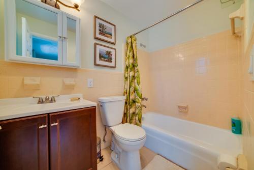 A bathroom at Beautiful Old Apartment with Beach Gear