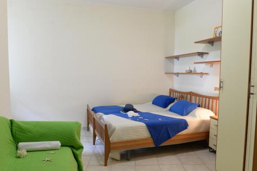 Ein Bett oder Betten in einem Zimmer der Unterkunft Appartamento La Poesia Luxury - MyHo Casa