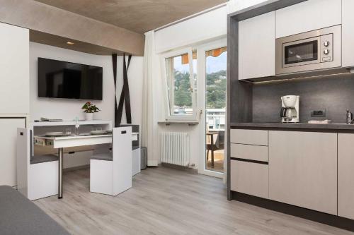 Kuchyň nebo kuchyňský kout v ubytování Residence Toblini