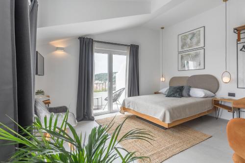Postel nebo postele na pokoji v ubytování Hvar Top View Apartments