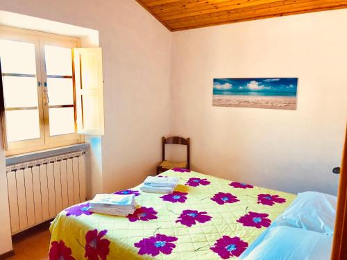 Postel nebo postele na pokoji v ubytování La vecchia canonica