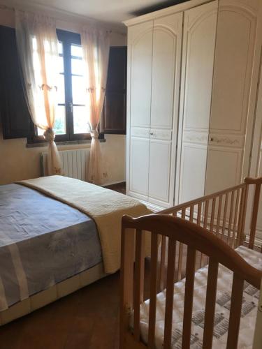 Łóżko lub łóżka w pokoju w obiekcie Le case della baracchina
