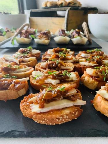 a bunch of pastries sitting on a table at Mont d'Or Monte Bello Estate in Bloemfontein