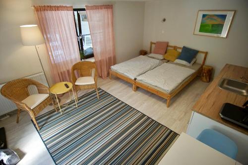 Postel nebo postele na pokoji v ubytování Das Tulpen Apartment